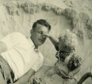 Mom with her father, toddler tweaks dad's nose, beach fun, my mom and grandfather, summertime fun, family time
